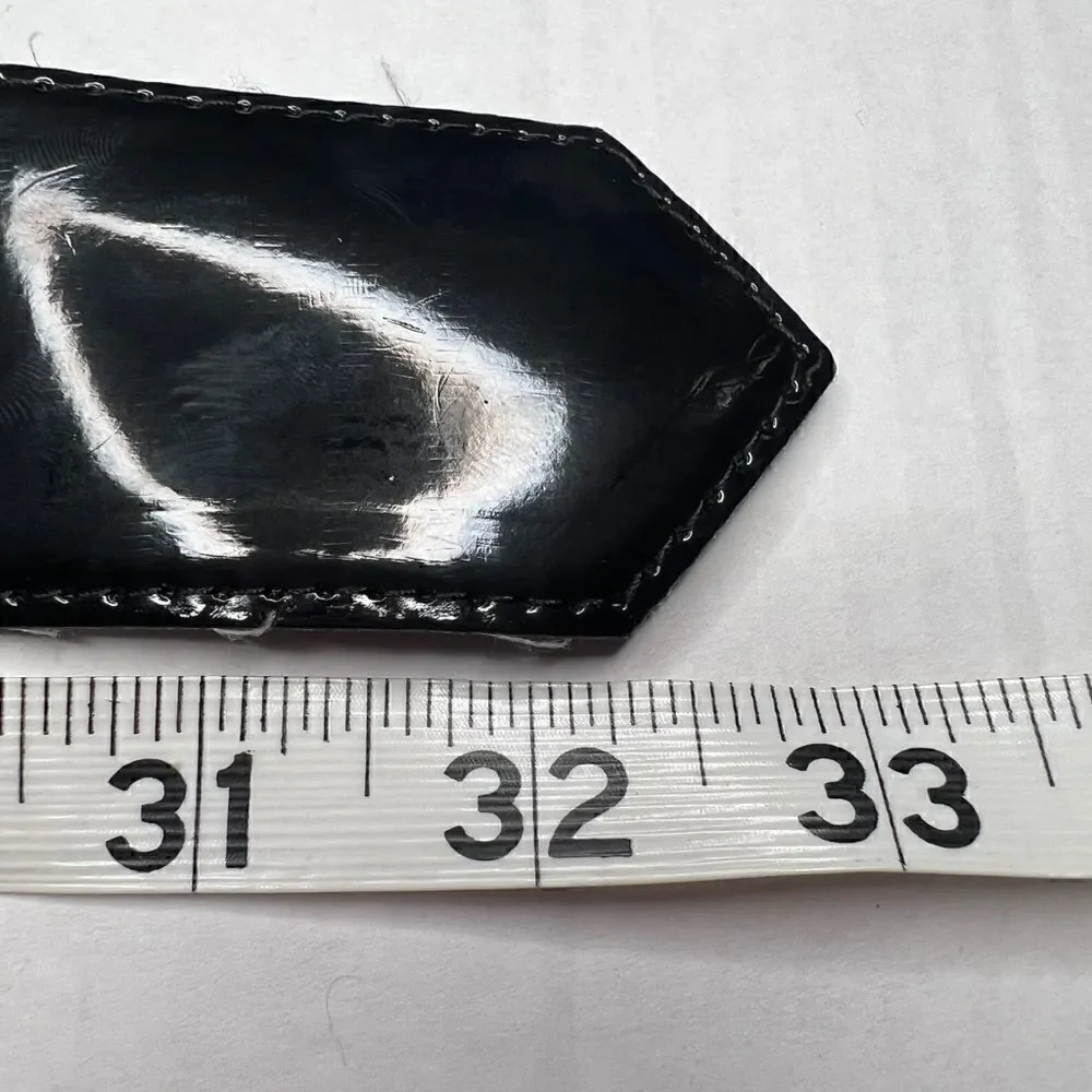 3/$15 or 5/$20 High waisted shiny black belt with elastic back 33”